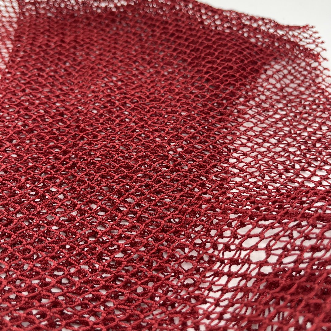 Filet de douche africain rouge